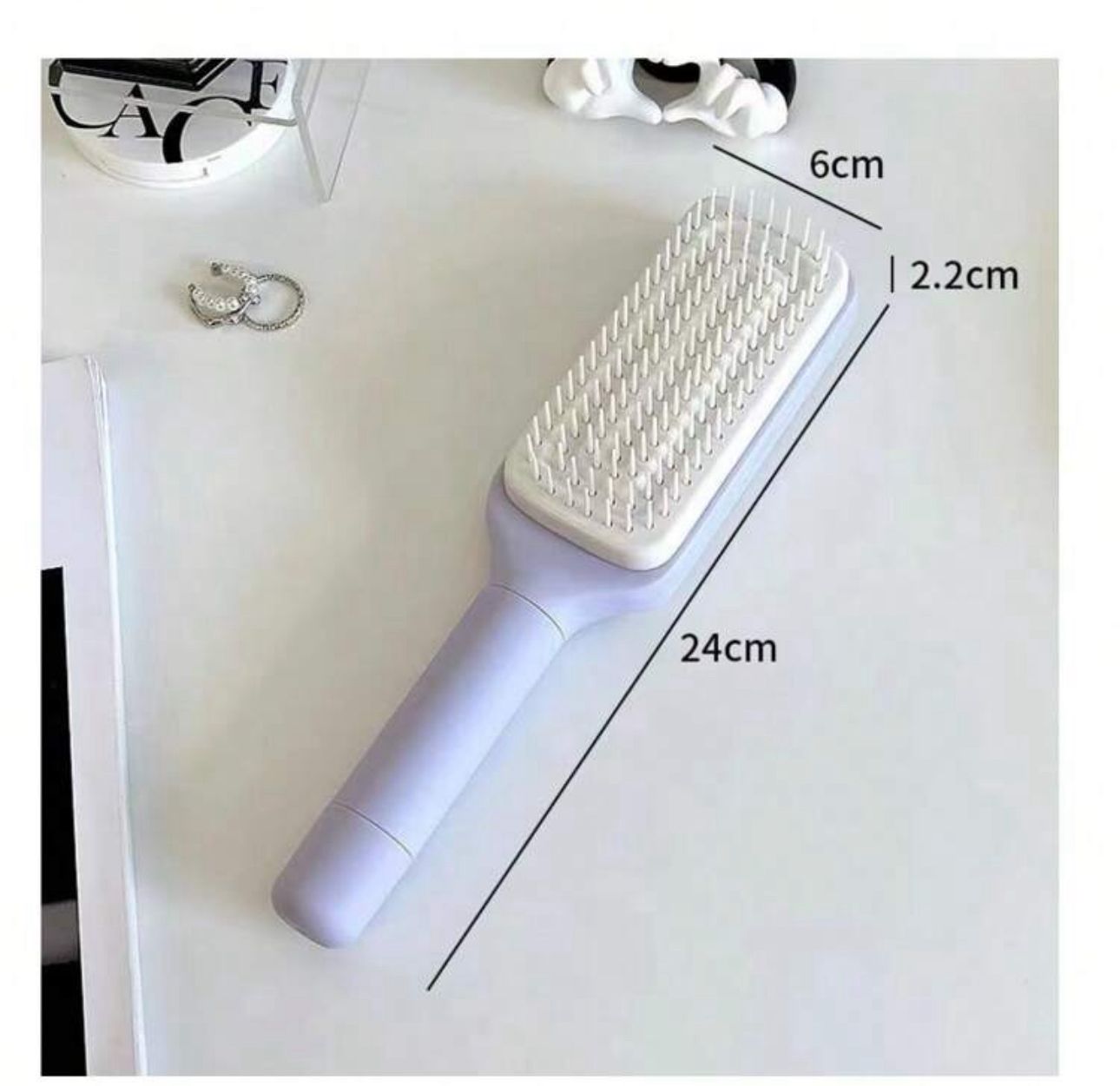 Self-Cleaning Retractable Hairbrush